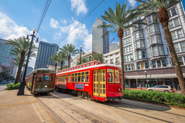 New Orleans, Louisiana, USA Street Cars New Orleans, Louisiana, USA downtown cityscape with and trollies. new orleans photos stock pictures, royalty-free photos & images