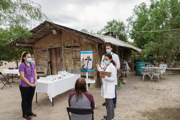 istock Health practitioners using telemedicine with patient in rural area 1326646713