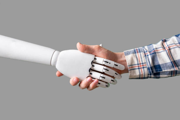istock human and machine robot hand shake hands, concept of future technology 1326647896