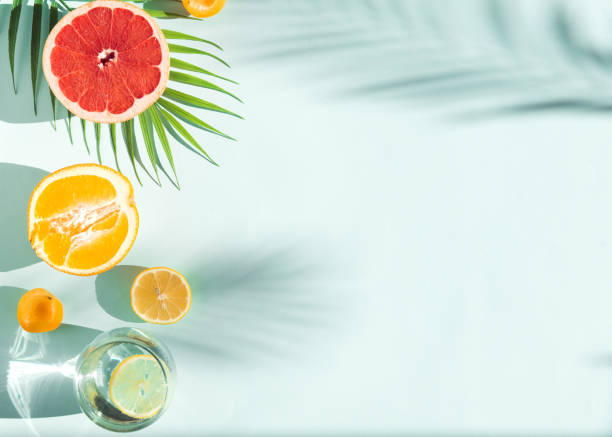 istock fresh summer fruit and water galss on blue background flat lay 1326648235