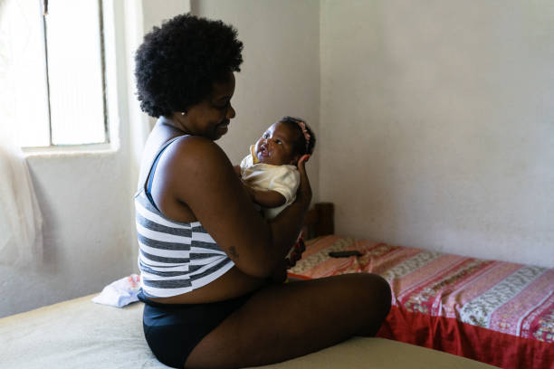 istock baby smiling with mom 1326649237