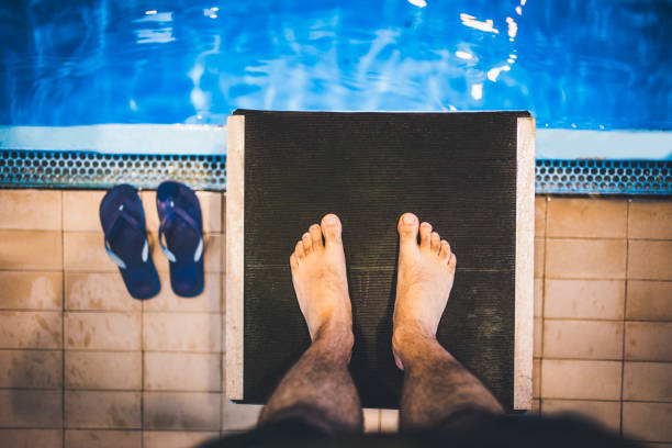 istock Swimmer on a swimming starting block 1326651924