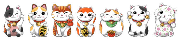 Set of adorable little kittens or cats with assorted accessories Set of adorable little cartoon Japanese lucky cats maneki neko holding coban coin with kanji meaning richness. Collection of oriental cartoon vector illustrations isolated on white background maneki neko stock illustrations