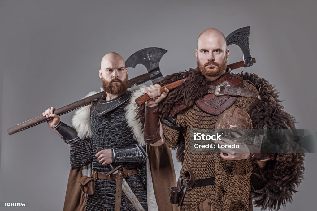 Two viking warrior brothers in studio shot Medieval Stock Photo