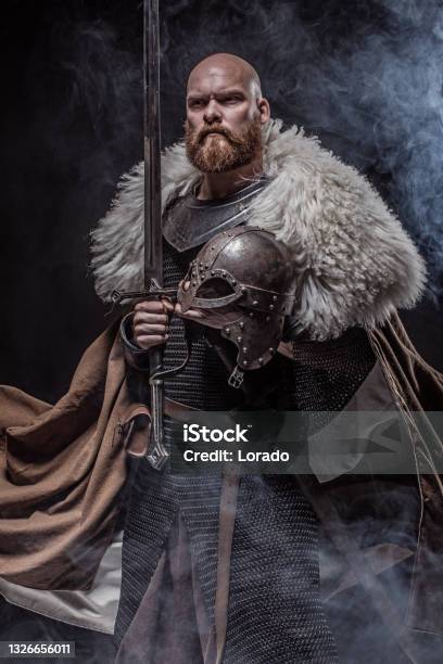 Weapon Wielding Redhead Viking Warrior In Studio Shot Stock Photo - Download Image Now