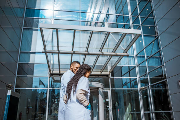 istock Two ethnic doctors on a medical campus 1326656226