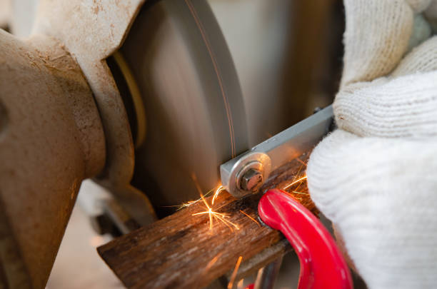 istock The craftsman adjusts the nut to the size. 1326656244