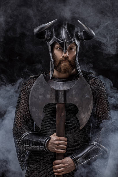 istock Viking wearing horned Helmet on a black background 1326659203