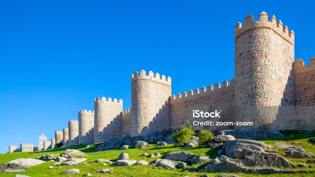 City walls of Avila City walls of Avila in Spain. Panoramic view of landmark Fortified Wall Stock Photo
