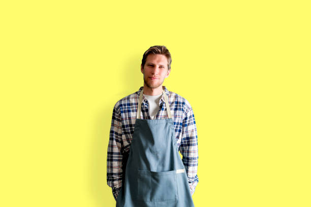 istock young male chef cook put with apron portrait 1326668809