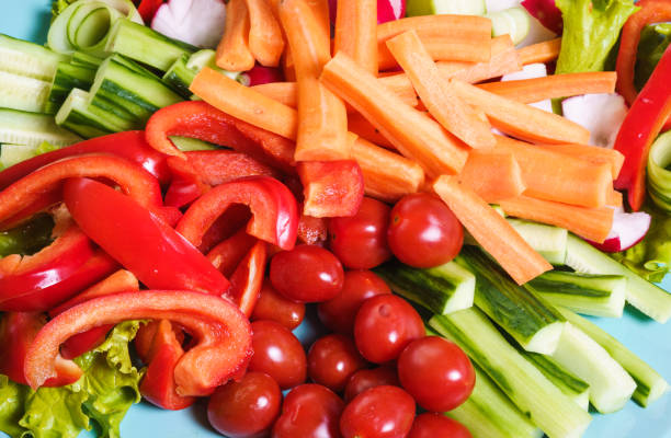 istock Composition of sliced fresh vegetables 1326671013