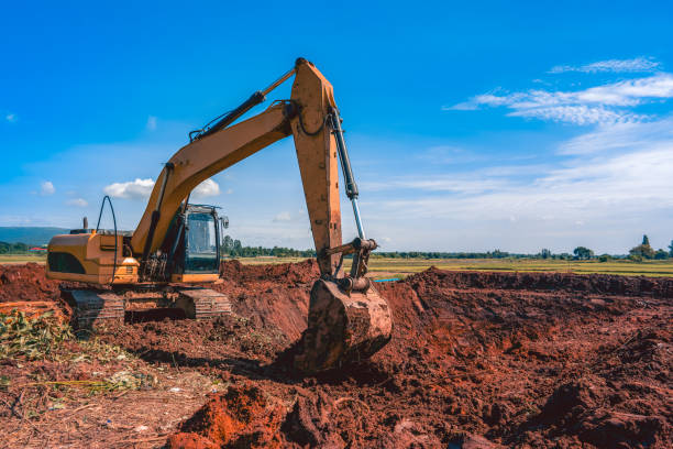 istock backhoe or excavator working on land of countryside 1326671215