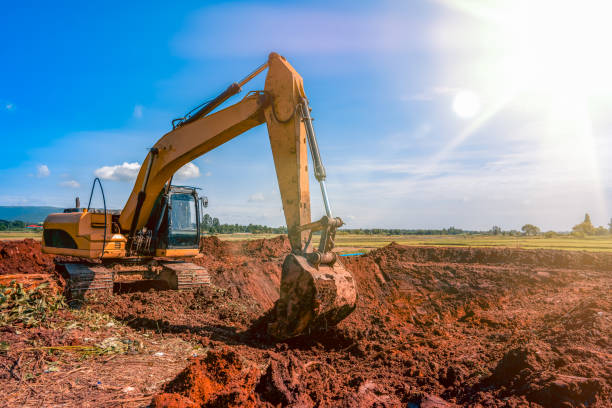 istock backhoe or excavator working on land of countryside 1326672871