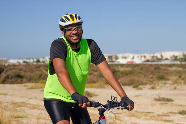 istock A black man cyclist goes for a ride 1326677322