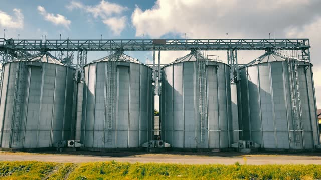 tanks for processing and storage of soybean and wheat grain. Harvesting and processing and storage elevator