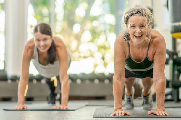 istock Enjoying the gym with a friend 1326683492