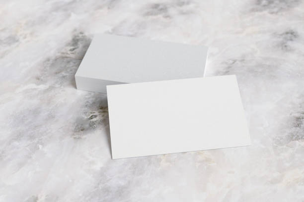 istock Business cards on marble surface. 3d illustraton. 1326685244