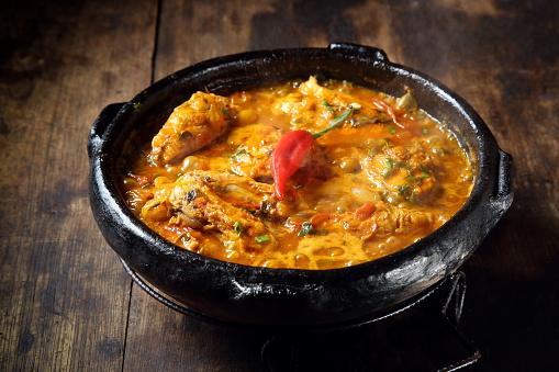 moqueca capixaba, a typical dish from the Brazilian region, made with fish, herbs, spices and annatto