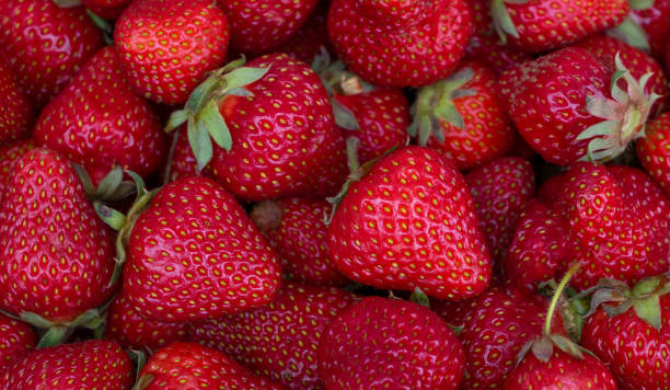 istock Fresh strawberries texture background - Delicios fruits and benefits 1326687431