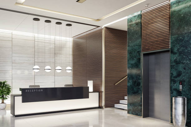 Modern Offices lobby interior area with elevators and stairs and with long reception desk Modern and luxurious Offices lobby interior area with elevators and stairs. Long reception desk.
green marble wall tiles decoration. 3d rendering gold desk lamp stock pictures, royalty-free photos & images