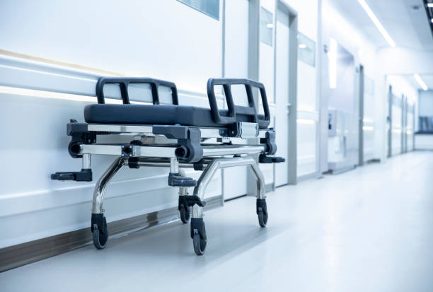 istock Long corridor in hospital with surgical beds 1326696117