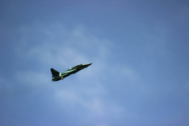 istock Fighter Aircraft Airplane Flying upon the sky 1326702972