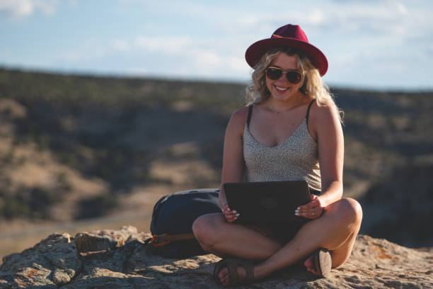 istock Woman Working On Her Computer And enjoying The Beautiful Nature Around Her 1326705267