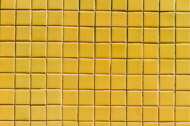istock WA wall surface with small yellow tiles 1326705409