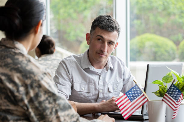 istock Mature financial planner meeting with a military solider. 1326707777