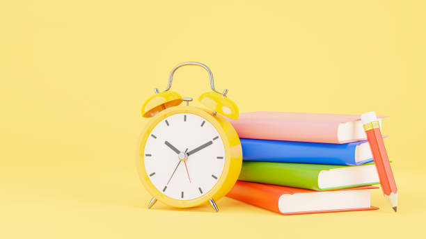 istock yellow alarm clock with education concep 1326709182