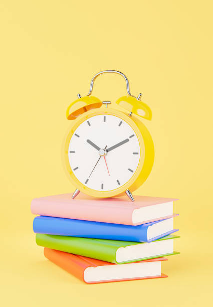 istock yellow alarm clock with education concept 1326709184