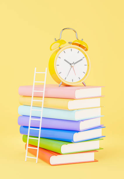 istock yellow alarm clock with education concept 1326709189