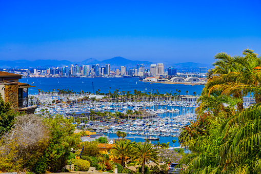 Overview of San Diego Bay with skyline of San Diego which is a city on the Pacific coast of California known for its beaches, parks and warm climate