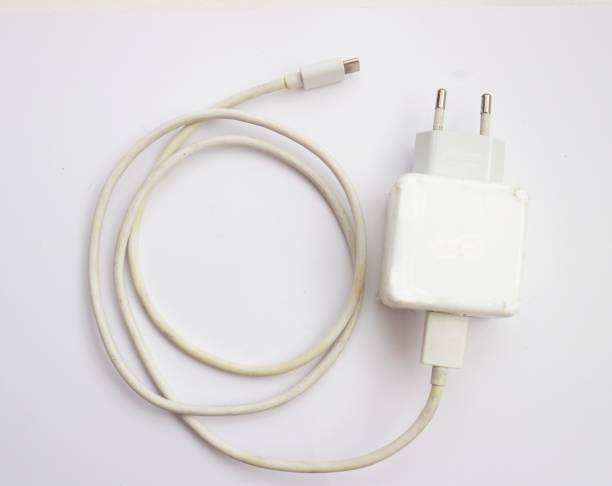 istock Mobile phone charger isolated on white background 1326717151