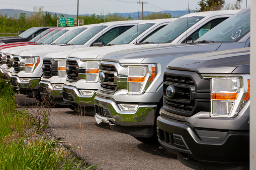 Saint Foy, Quebec, Canada - May 18, 2021:2021 Ford F-150 pickup trucks in parking lot of Ford Dealership.