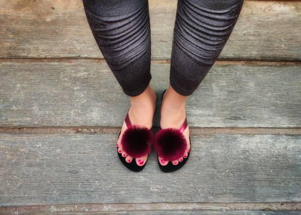 istock girl's feet in red sandals 1326720587