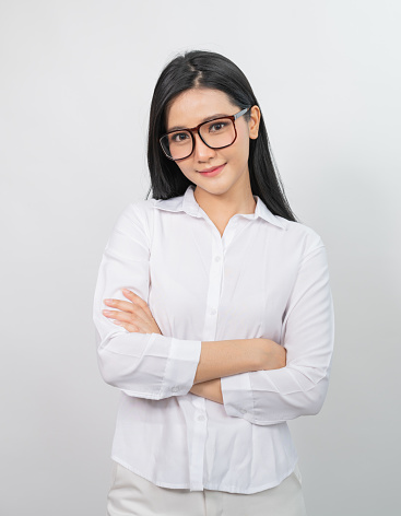 Photo of a successful young office lady wearing glass on white background.