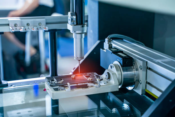 istock The multi-axis CMM machine measure the aluminum mobile phone part . 1326729281