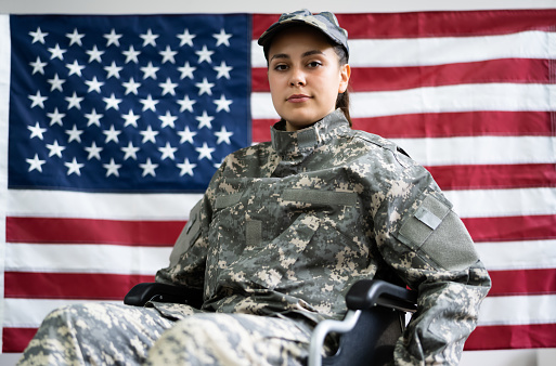 Patriotic Young Veteran Soldier In Wheel Chair