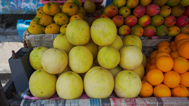 istock Grapefruit, orange, mangoes fruit for sale in a fruit shop 1326733559