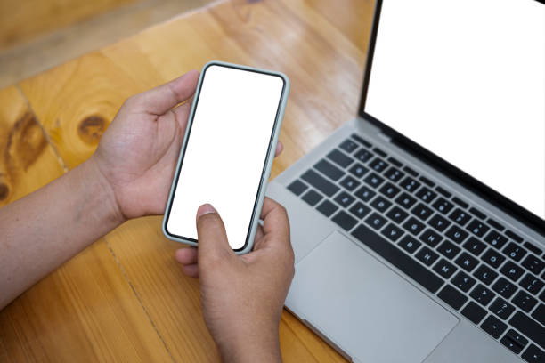 istock Close up view woman holding mock up mobile phone with empty display. 1326734494