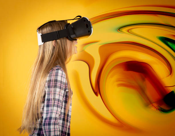 istock girl wearing virtual reality glasses, distorted background 1326741514