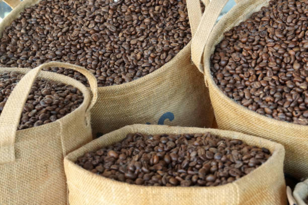 istock Roasted Black brown coffee beans in a sack 1326747370