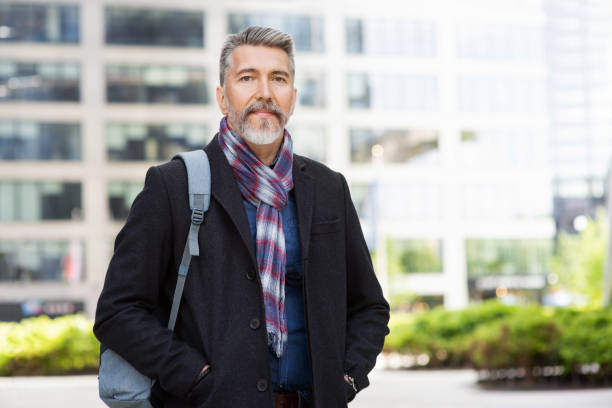 Handsome mature man city portrait
