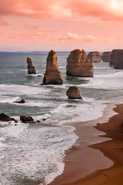 Great Ocean Road in Victoria, Australia Great Ocean Road is one of the most beautiful scenic roads in the world. It runs between Geelong and Warnambool in the south eastern coast of Australia twelve apostles sea rocks victoria australia stock pictures, royalty-free photos & images