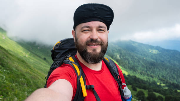 istock Hiker taking selfie in the mountains 1326753807