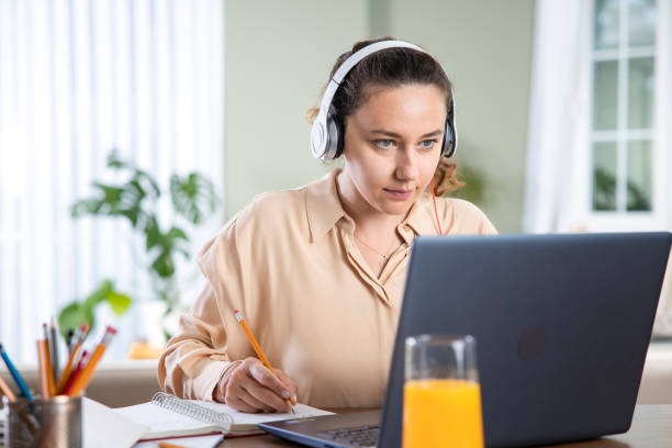istock Young woman working from home 1326757460