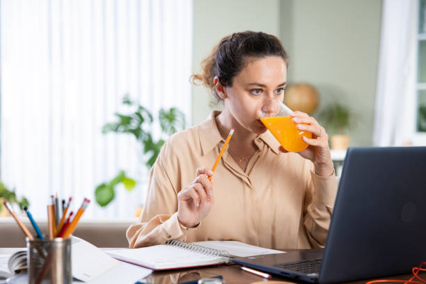 istock Young woman working from home 1326757683