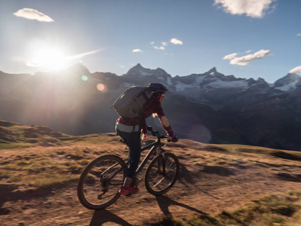 istock Mountain biker on dirt trail, Switzerland 1326758965