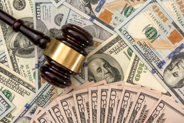 istock financial judges gavel with dollars 1326761153